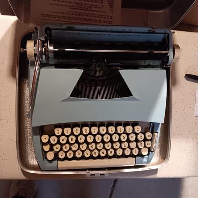 BABY BLUE TOWER MANUAL TYPEWRITER IN A CASE