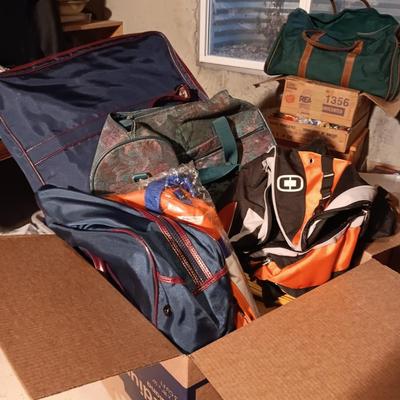 BOX OF DUFFLE BAGS AND SOFT SIDED SUITCASES