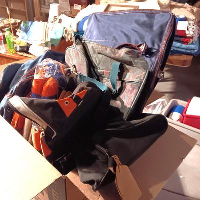 BOX OF DUFFLE BAGS AND SOFT SIDED SUITCASES