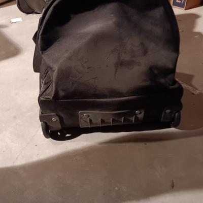 SAMSONITE 4 WHEEL SUITCASE AND A NRA DUFFLE BAG ON 2 WHEELS WITH HANDLE