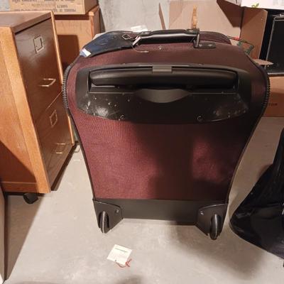 SAMSONITE 4 WHEEL SUITCASE AND A NRA DUFFLE BAG ON 2 WHEELS WITH HANDLE