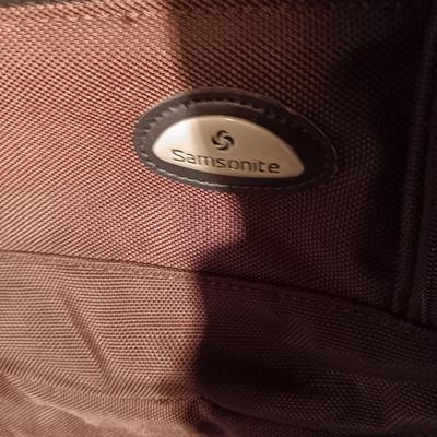 SAMSONITE 4 WHEEL SUITCASE AND A NRA DUFFLE BAG ON 2 WHEELS WITH HANDLE