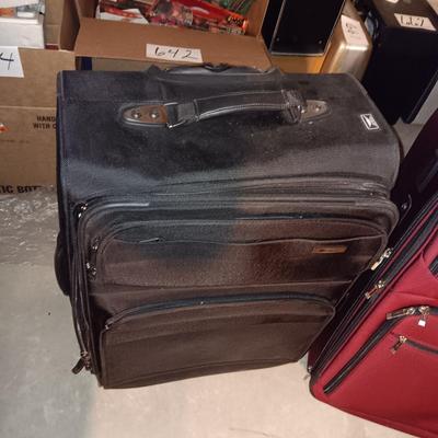 2 SUITCASES ON 2 WHEELS WITH HANDLES