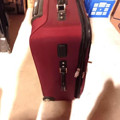 2 SUITCASES ON 2 WHEELS WITH HANDLES