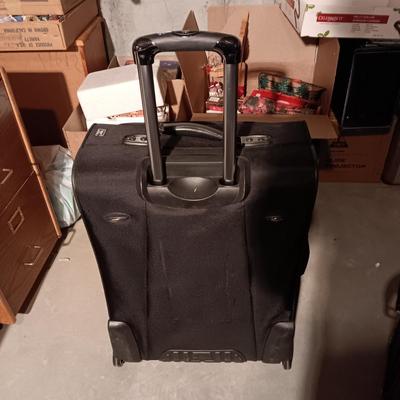 2 SUITCASES ON 2 WHEELS WITH HANDLES