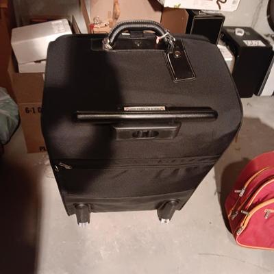 SAMSONITE SUITCASE ON 4 WHEELS AND BAGGALLINI CARRY ON