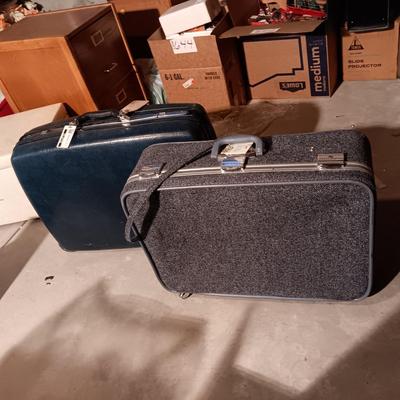 SKYWAY AND SAMSONITE VINTAGE SUITCASES EACH WITH 2 WHEELS, HANDLES ON THE SIDES