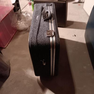 SKYWAY AND SAMSONITE VINTAGE SUITCASES EACH WITH 2 WHEELS, HANDLES ON THE SIDES