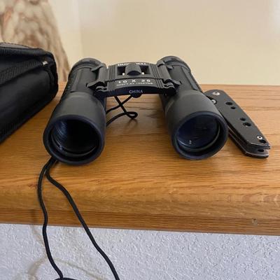 BUSHNELL BINOCULARS AND A GERBER POCKET KNIFE