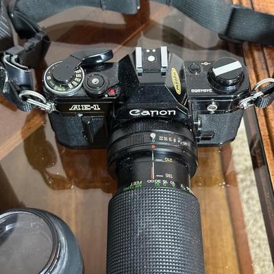CANON AE-1 35MM CAMERA WITH VIVITAR LENS AND MORE
