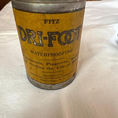 Vintage tins cans and bottles