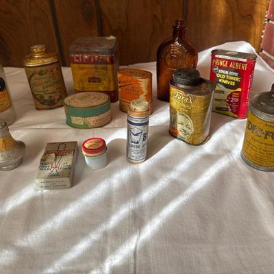 Vintage tins cans and bottles