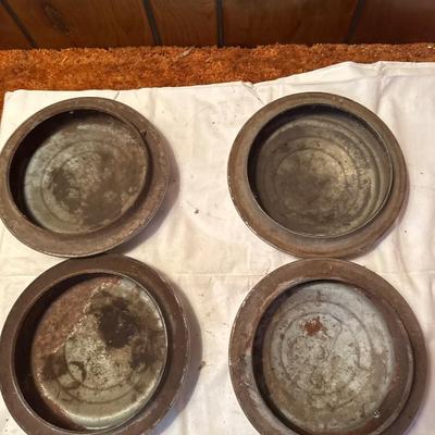 The object pictured is a Chevrolet "Dog Dish" hubcap, likely from the model years 1951-1953.