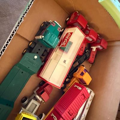 2 boxes of vintage trucks/tractors/toys