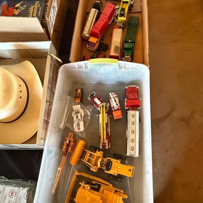 2 boxes of vintage trucks/tractors/toys
