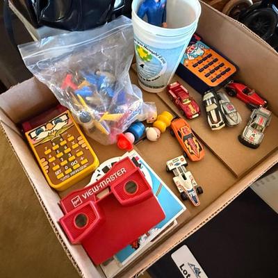 3 Boxes Vintage Toys-View Master w/some slides, mini NFL football Helmets, cars