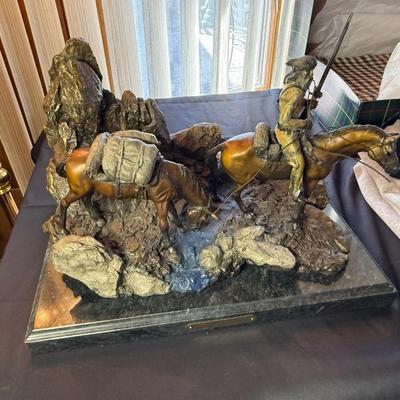 Bronze Free Trappers signed by D. Davies dated 1999 on marble base