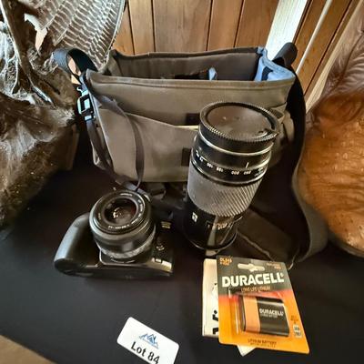 Vintage Minolta 35mm Camera w/lens + long 75-300 lens plus carrying bag