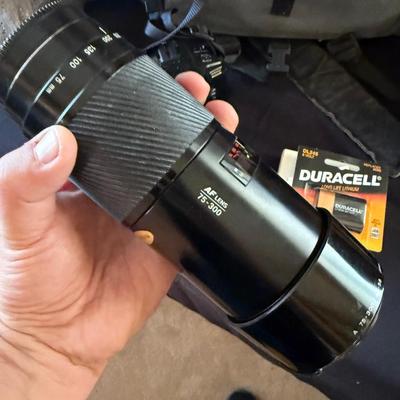 Vintage Minolta 35mm Camera w/lens + long 75-300 lens plus carrying bag
