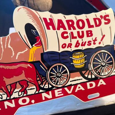 Vintage metal Harold’s Club or Bust Reno NV sign/license plate topper