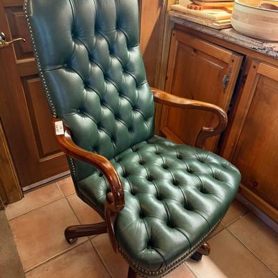 Rolling tufted green leather & wood Arm Chair w/brass tacks