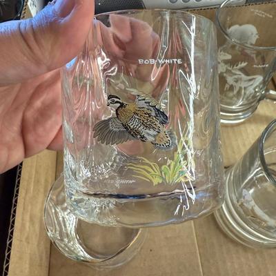 Box of 7 mugs and glasses with Ned Smith artwork