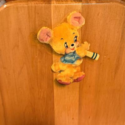 small child’s wooden rocking chair