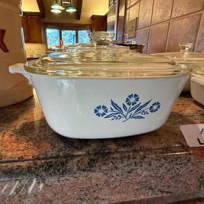 4 Corningware casserole dishes w/lids in sunflower pattern