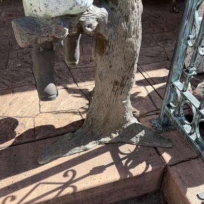 Bronze life sized boy sitting on tree stump with puppy about 4’ tall