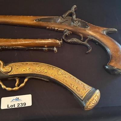 Trio of metal flintlock/musket looking gun decorative wall pieces