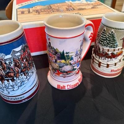 Set of 5 Beer Steins - 2 Budweiser, 1 Disneyworld, 2 Super bowl XVI & XVII
