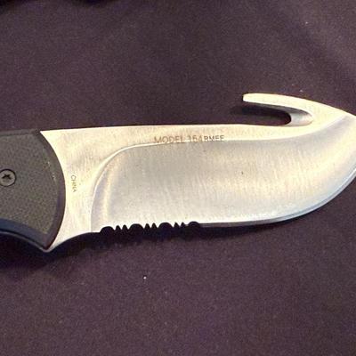 Pair of RMEF fixed blade knives in single sheath