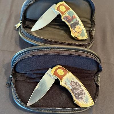 Pair of Franklin Mint collector pocket knives - w/zip up cases