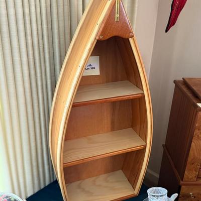 Canoe motif wood with brass accent 35”t x 16”w wall shelf