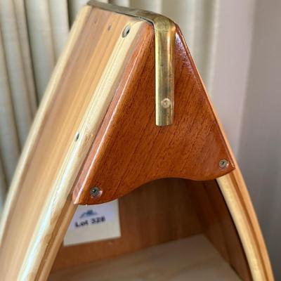 Canoe motif wood with brass accent 35”t x 16”w wall shelf