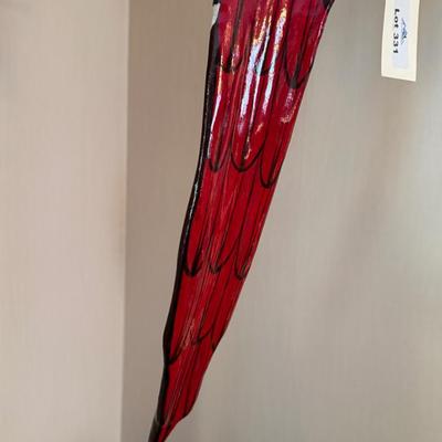 Colorful Red Parrot on brass bird stand/pirch