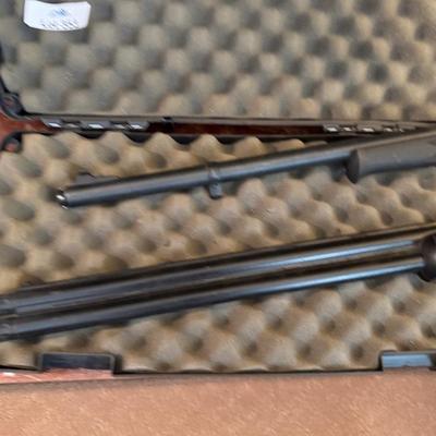 Pair of Replica black rifles and padded carrying case