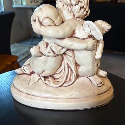 Cherub Statue with Two Figures