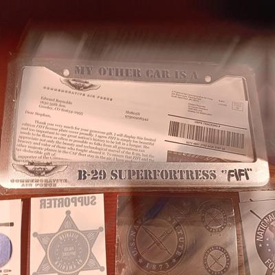 LICENSE PLATE FRAMES, BUMPER STICKERS AND PATCHES