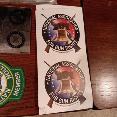 LICENSE PLATE FRAMES, BUMPER STICKERS AND PATCHES