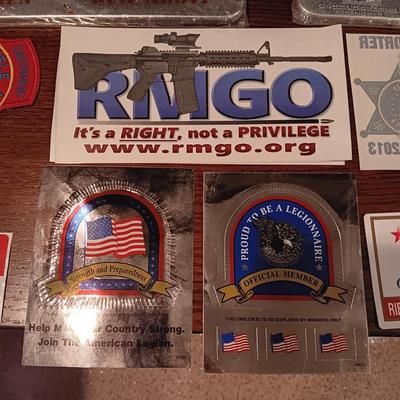LICENSE PLATE FRAMES, BUMPER STICKERS AND PATCHES