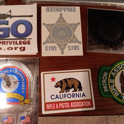 LICENSE PLATE FRAMES, BUMPER STICKERS AND PATCHES