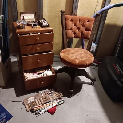 ANTIQUE CHAIR ON CASTERS AND A SMALL 4 DRAWER CHEST PACKED WITH SEWING NOTIONS AND CRAFT SUPPLIES