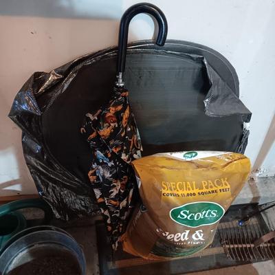 UNOPENED BAG OF FERTILIZER, YARD TOOLS, WINDSHIELD SUN SHADE AND MORE
