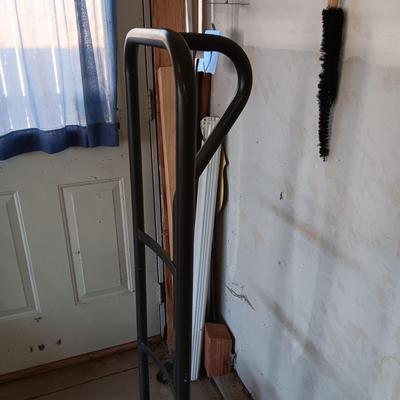 FURNITURE DOLLY AND EXTENSION CORD ON A REEL