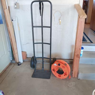 FURNITURE DOLLY AND EXTENSION CORD ON A REEL