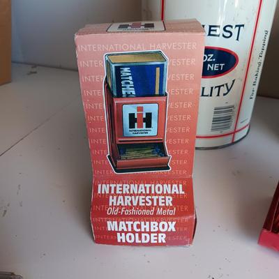 CLAY JUG, INTERNATIONAL HARVESTER MATCH HOLDER AND AN OLD TIN