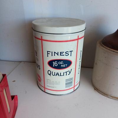 CLAY JUG, INTERNATIONAL HARVESTER MATCH HOLDER AND AN OLD TIN