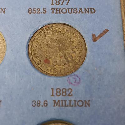 PARTIALLY FILLED BOOK OF INDIAN HEAD PENNIES