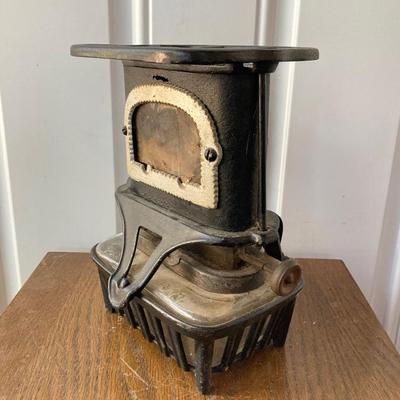 LOT 59: Antique Cast Iron Fairy Queen Stove / Lantern